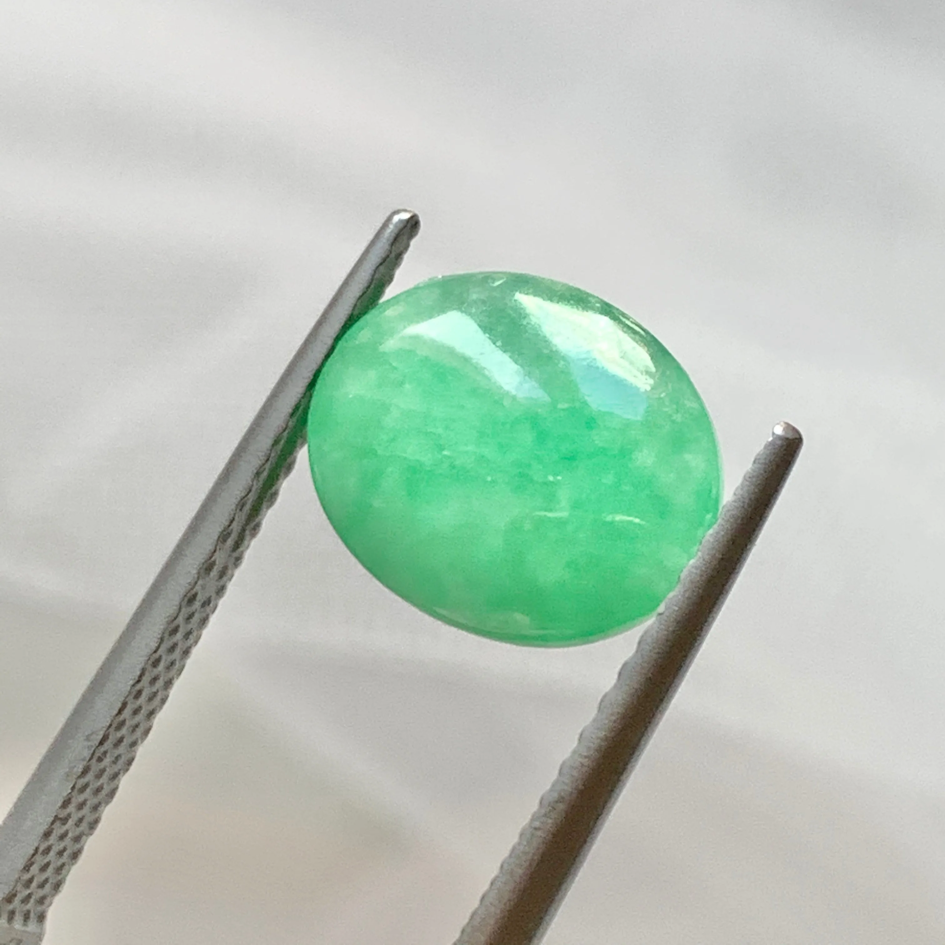 3.55ct A-Grade Natural Moss On Snow Jadeite Oval Cabochon No.130214